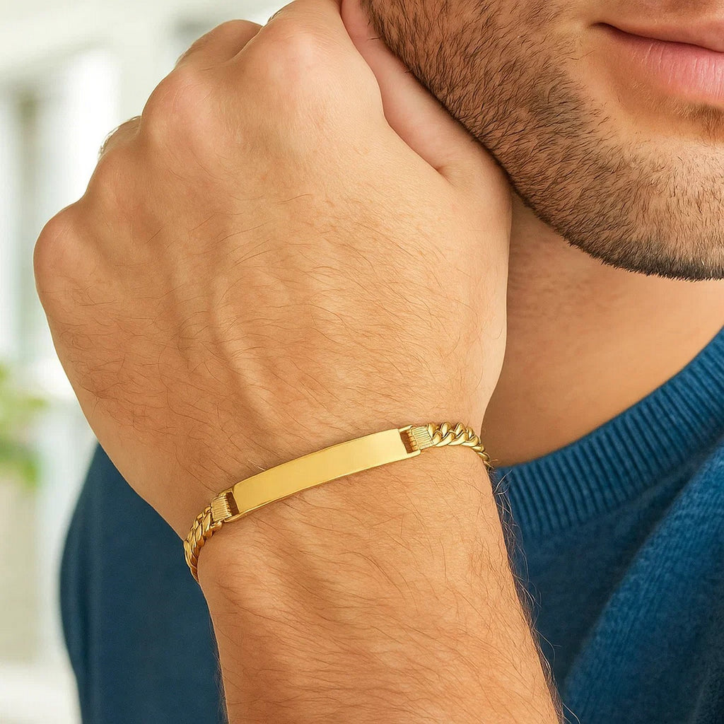 14k yellow gold Lite Cuban ID bracelet with modern link design, showcasing elegance and luxury in every detail.