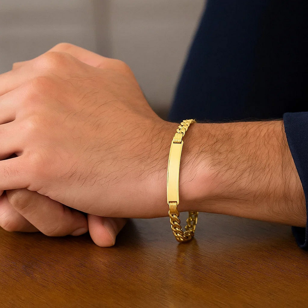 14k yellow gold Lite Cuban ID bracelet with modern link design, showcasing elegance and luxury in every detail.