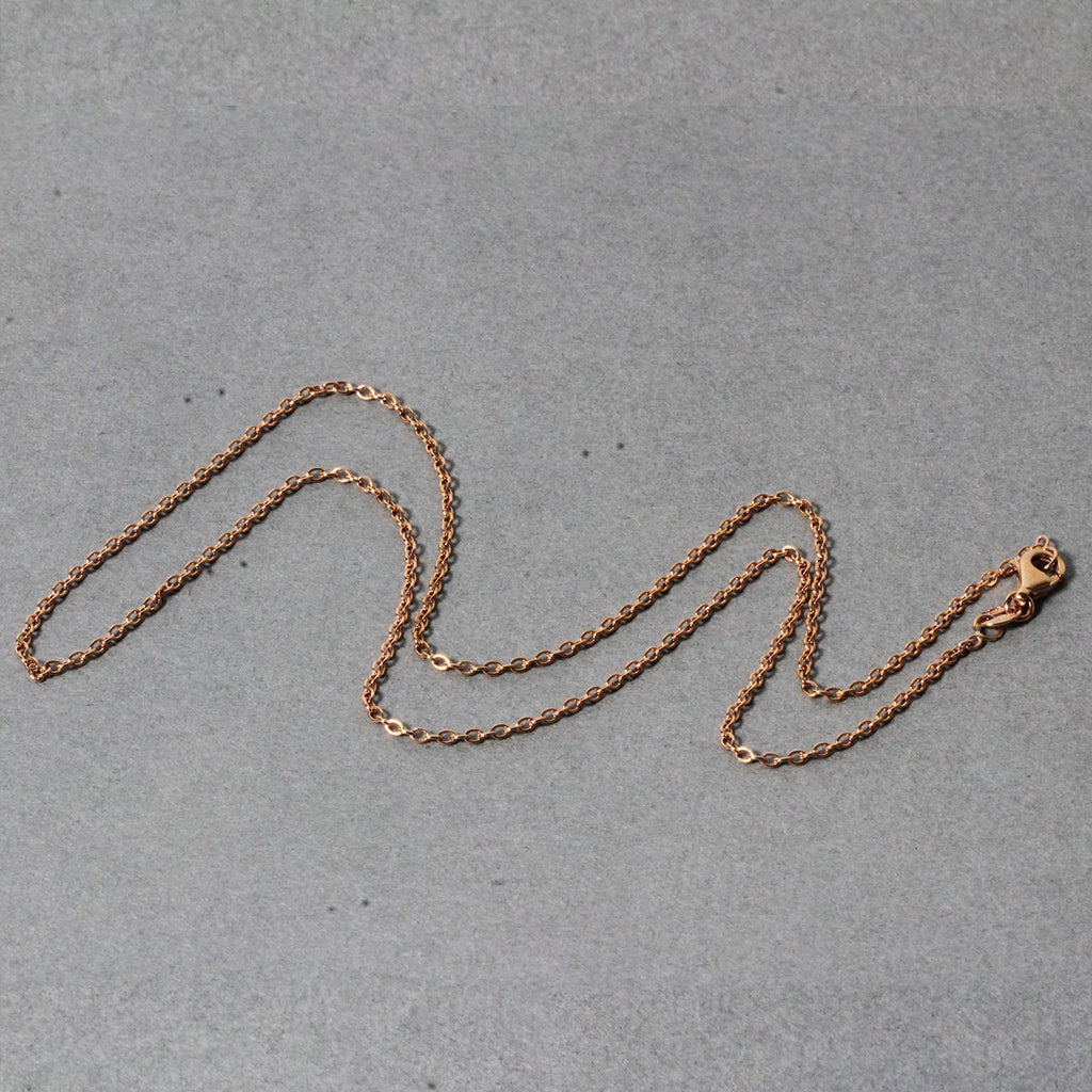 14k rose gold round cable link chain, modern design with elegant links, perfect for layering or standalone wear.