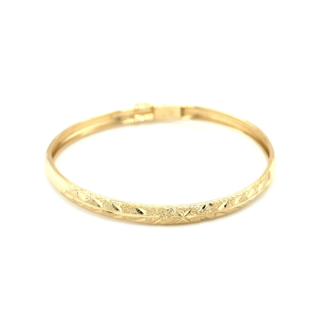10k yellow gold dome bangle with diamond cut Florentine finish, perfect for elegant children's jewelry.