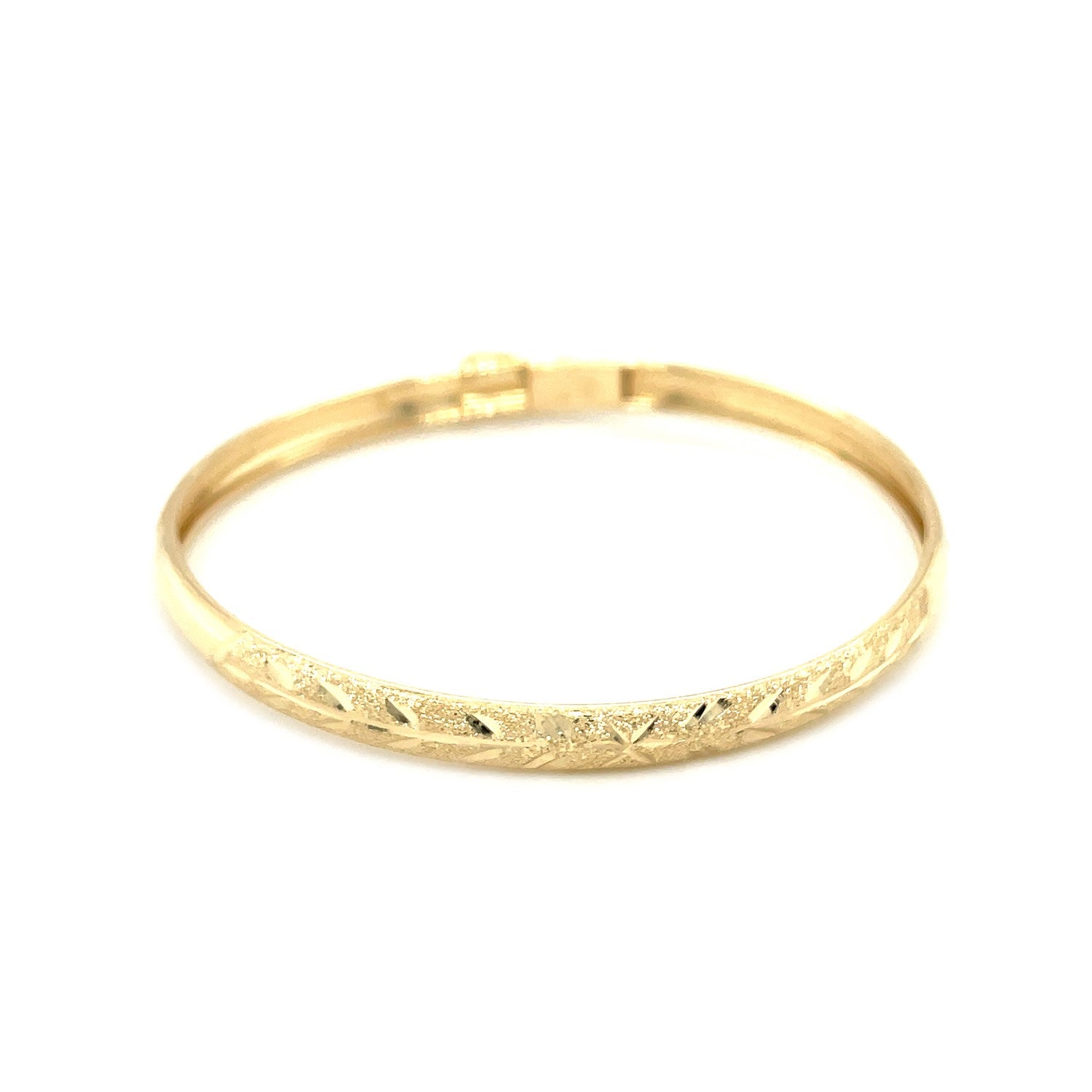 10k yellow gold dome bangle with diamond cut Florentine finish, perfect for elegant children's jewelry.