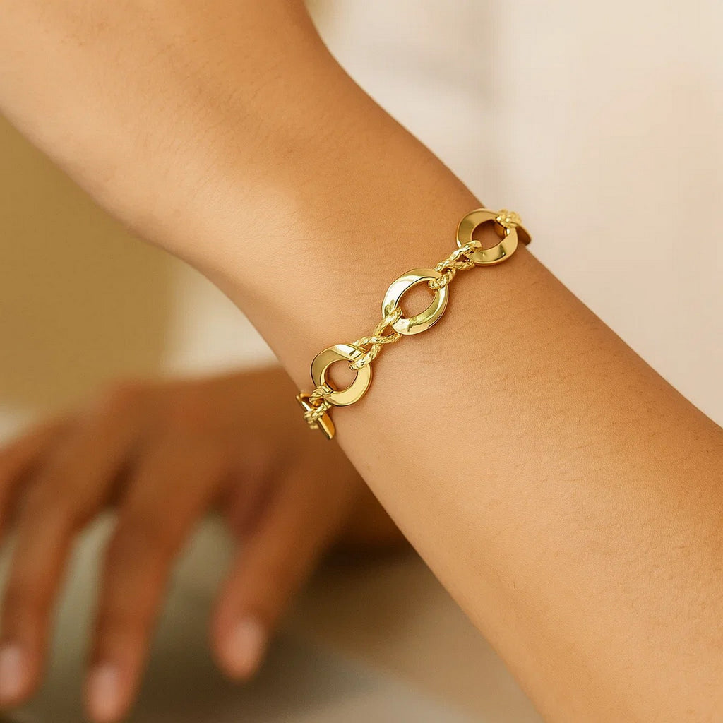 14k yellow gold contemporary infinity link bracelet showcasing elegant design and luxurious shine.