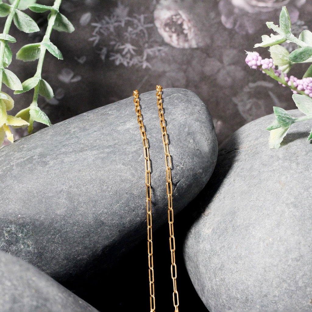 14k yellow gold adjustable paperclip chain with modern design, perfect for layering or wearing solo.
