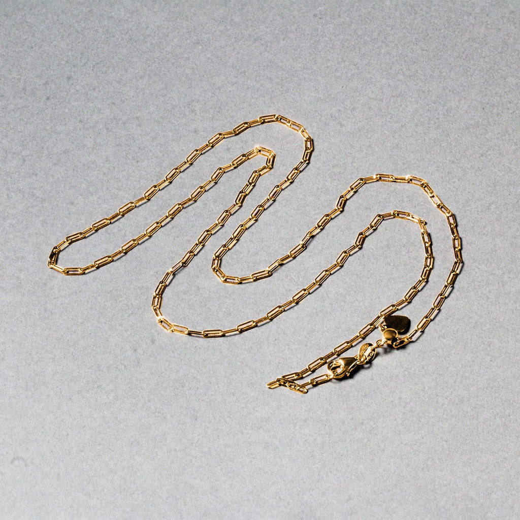 14k yellow gold adjustable paperclip chain with modern design, perfect for layering or solo wear.