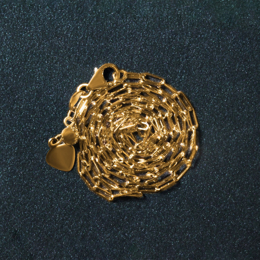 14k yellow gold adjustable paperclip chain with a modern design, perfect for layering or standalone elegance.