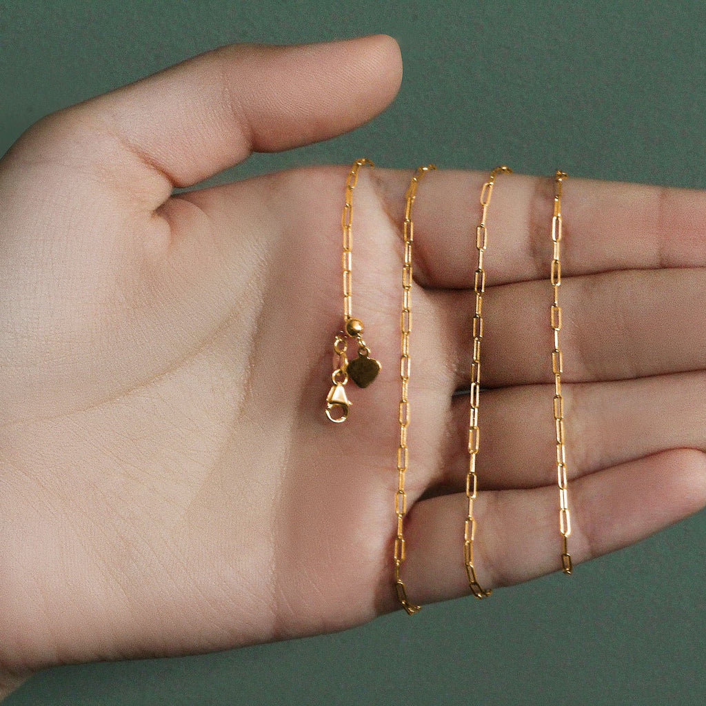 14k yellow gold adjustable paperclip chain, modern design, perfect for layering or standalone elegance.