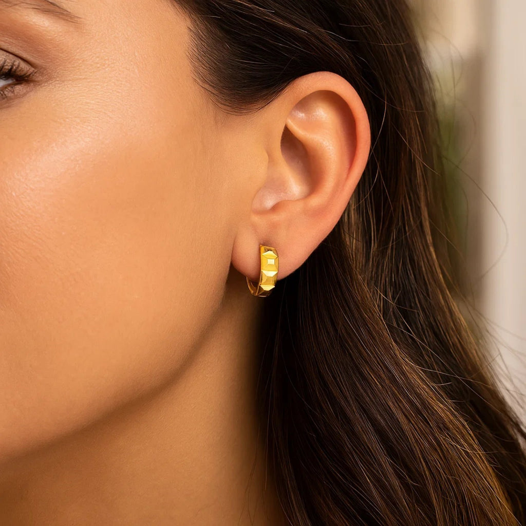 14k yellow gold modern J hoop earrings showcasing a sleek, elegant design for a luxurious touch.