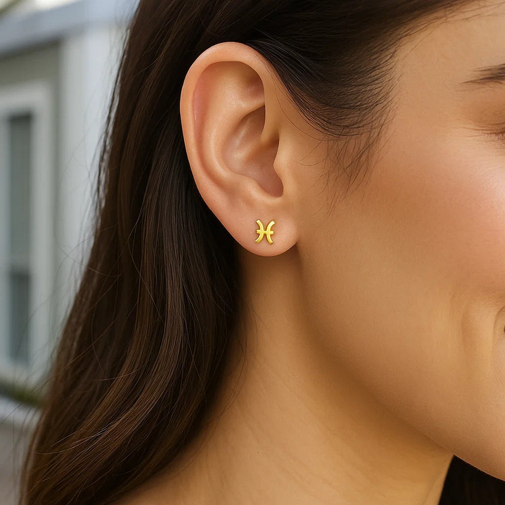 14k yellow gold modern Pisces stud earrings featuring a sleek design for elegant everyday wear.