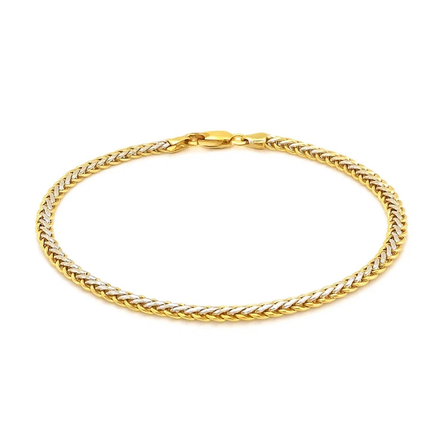 Elegant two-toned fine wheat chain bracelet in 10k yellow and white gold, featuring a luxurious link design.
