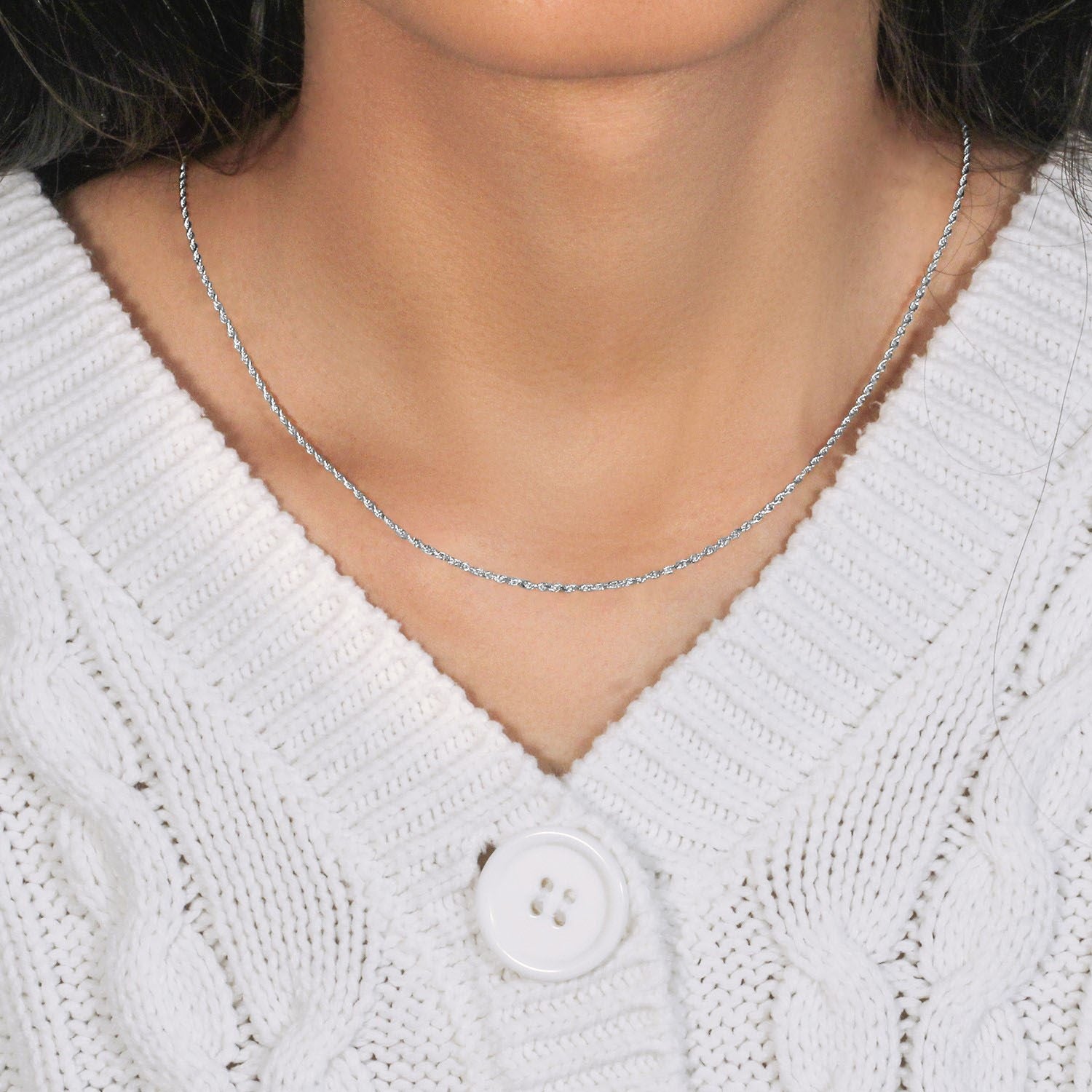 10k white gold diamond cut rope chain, modern design, featuring intricate links and a luxurious shine, perfect for layering.