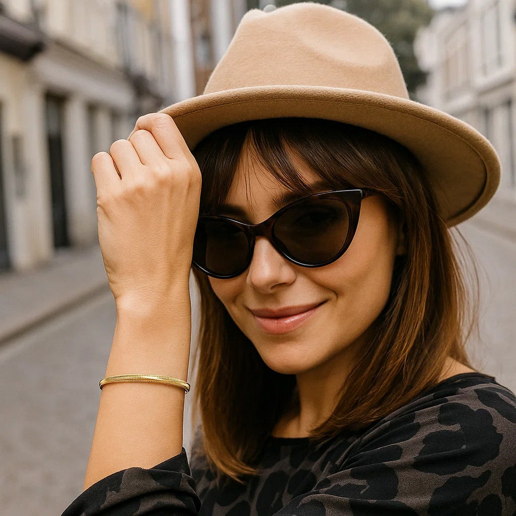 14K yellow gold medium stretch mesh bracelet featuring a contemporary design and elegant stud detail.