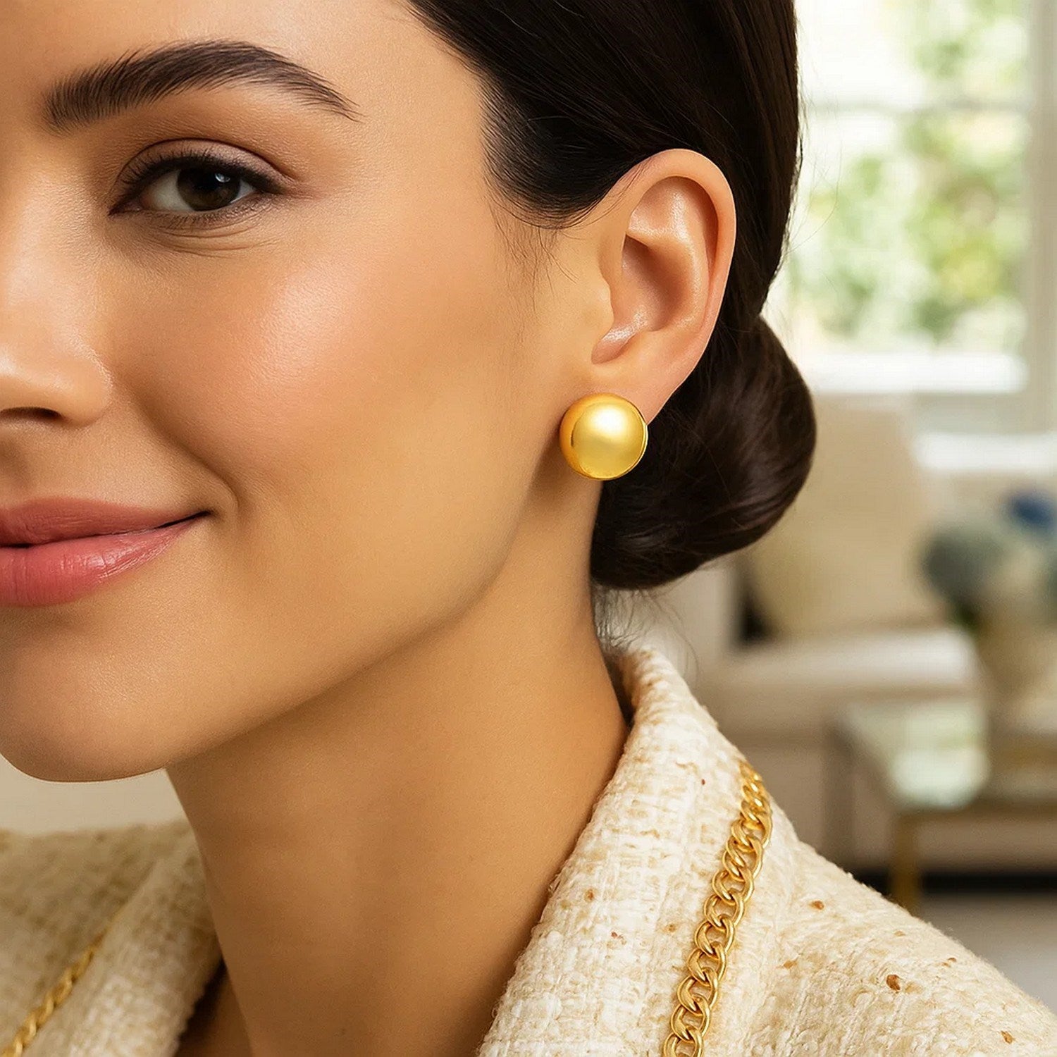 14k yellow gold modern puffed button stud earrings with a sleek, polished finish for a luxurious touch.