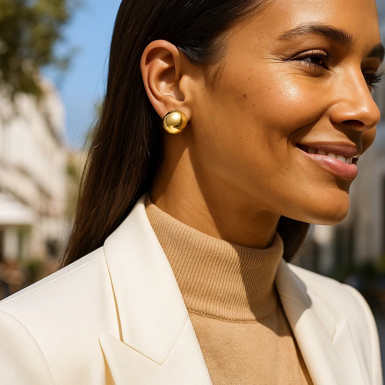 14K yellow gold modern puffed up button stud earrings with a sleek, polished finish for elegant sophistication.
