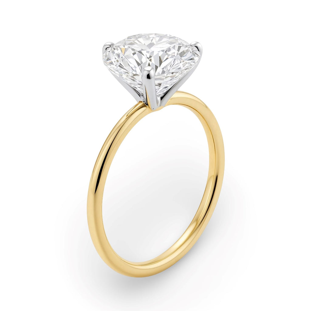 2 carat round lab-grown diamond solitaire ring in 14k yellow gold, showcasing modern elegance and timeless beauty.