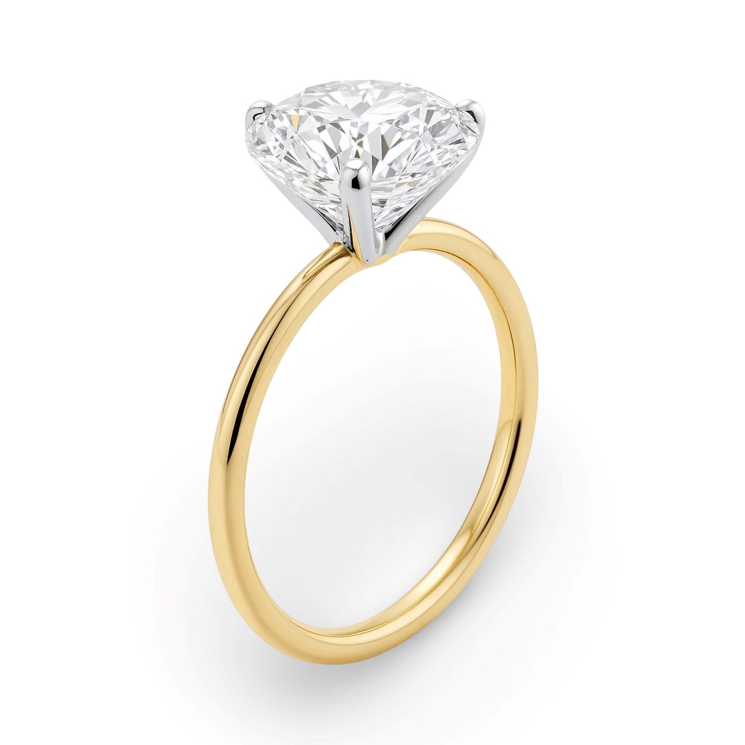2 carat round lab-grown diamond solitaire ring in 14k yellow gold, showcasing modern elegance and timeless beauty.