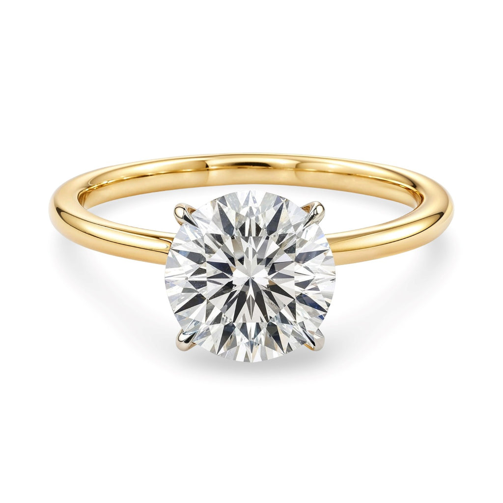 14k yellow gold modern solitaire ring featuring a stunning 2 carat round lab-grown diamond, IGI G/VS1 certified.