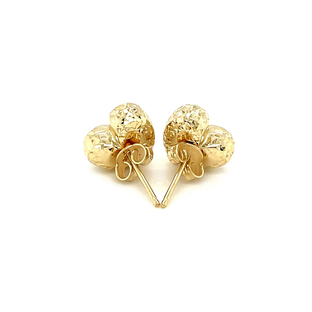 14k yellow gold diamond-cut puffed heart earrings, elegantly designed for a luxurious touch to any outfit.