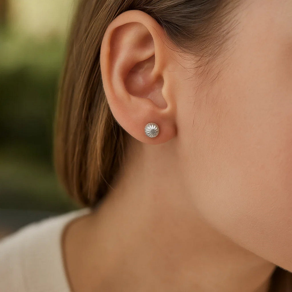 14k white gold textured ball stud earrings, showcasing a classic design with elegant craftsmanship and timeless appeal.