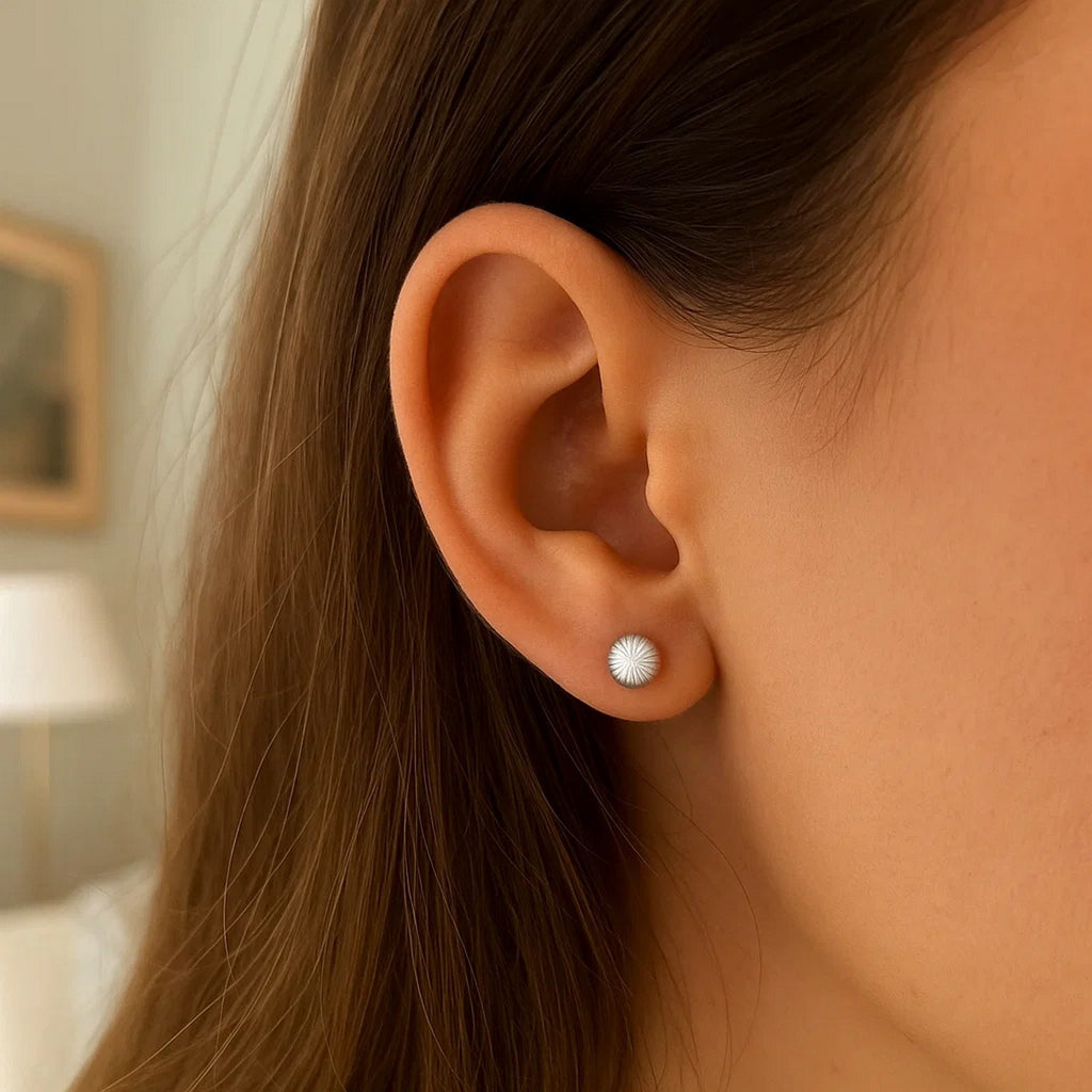 14k white gold textured ball stud earrings showcasing a classic design for timeless elegance.