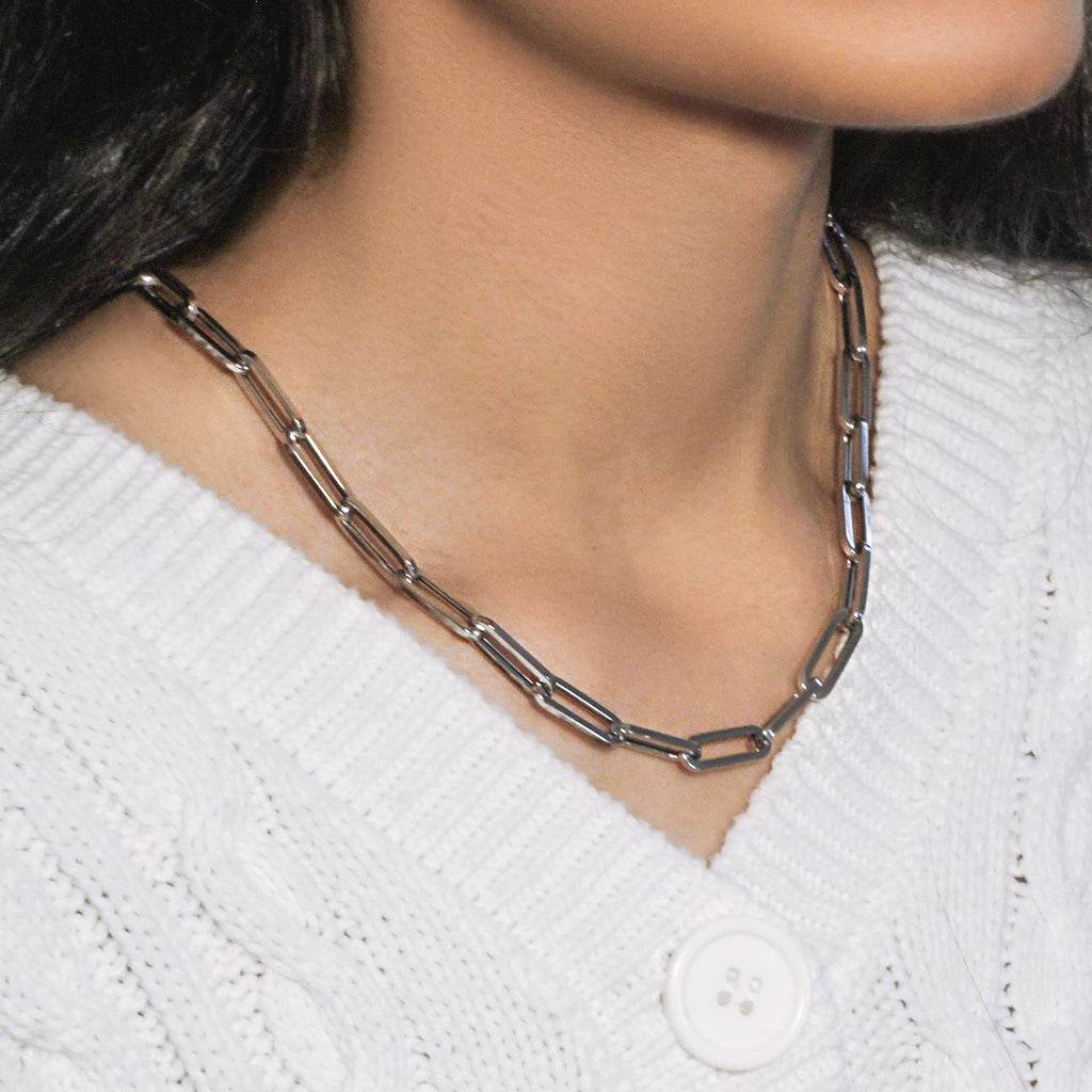 14k white gold wide paperclip chain, modern design with sleek rounded links, perfect for layering or standalone elegance.