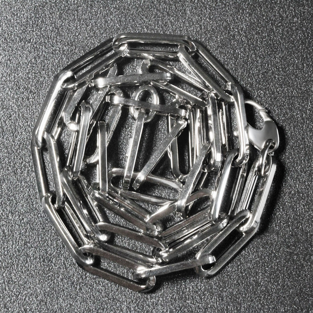 14K white gold wide paperclip chain, modern design with sleek round links, perfect for layering or standalone elegance.