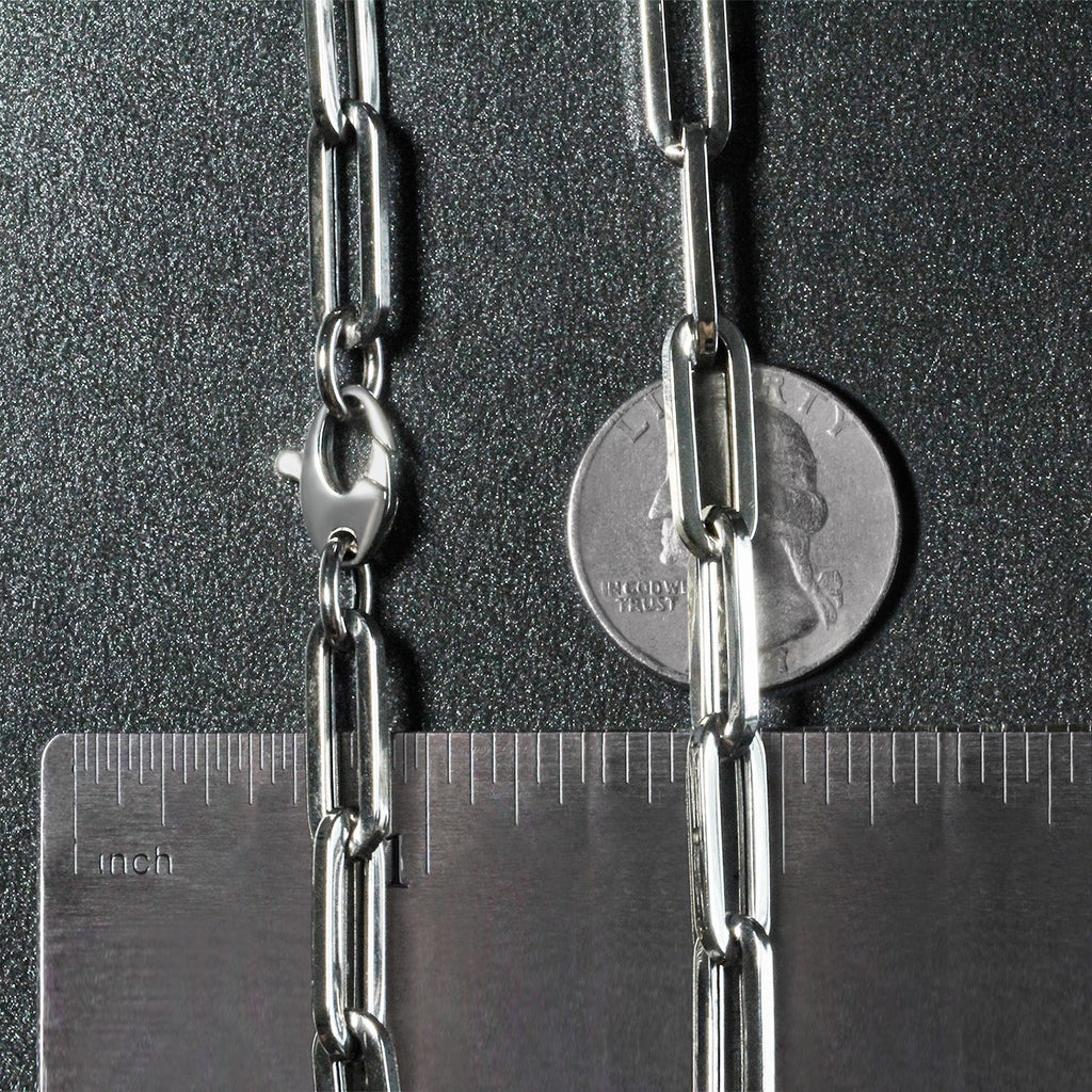 14k white gold wide paperclip chain, modern design with sleek round links, perfect for layering or standalone elegance.