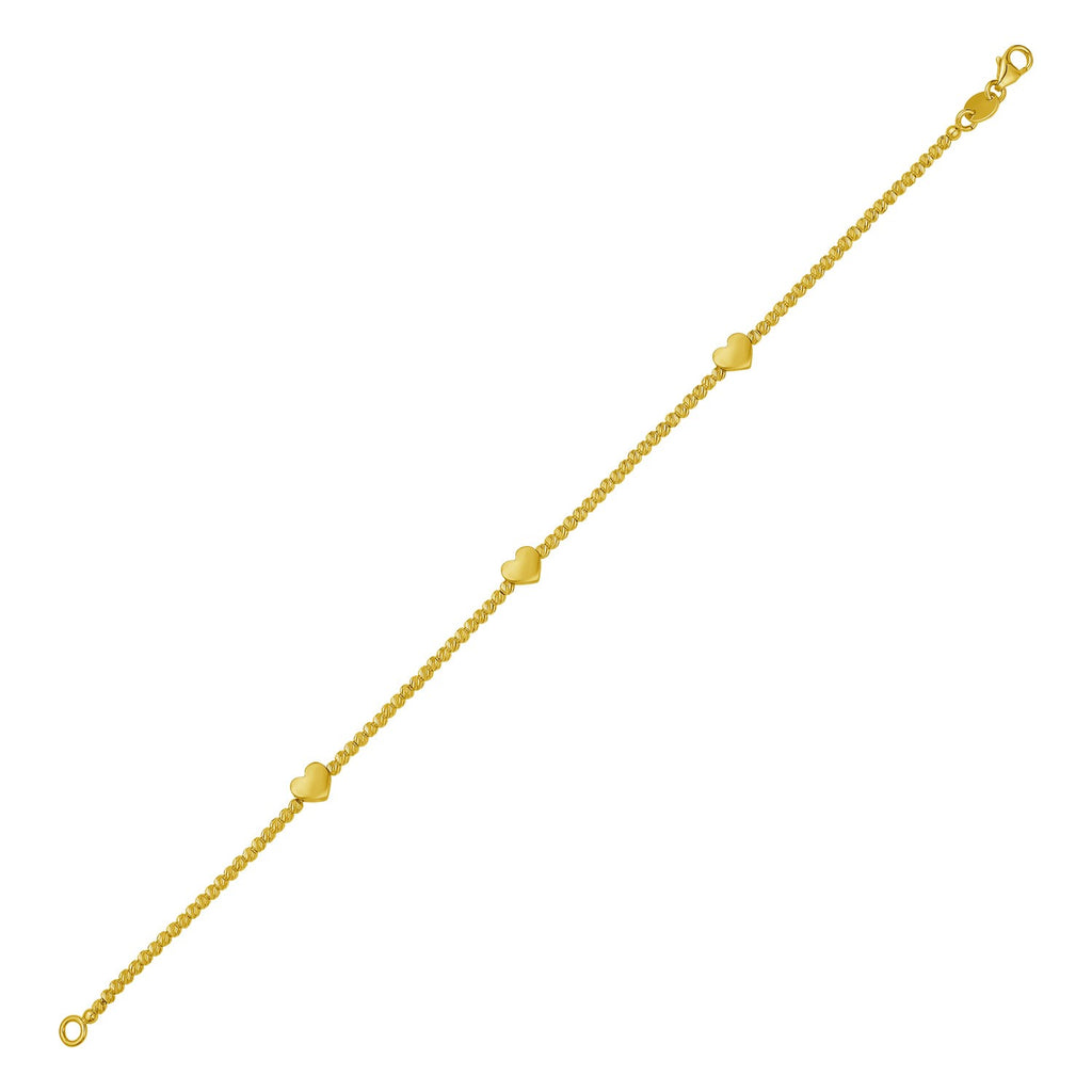 14k yellow gold heart station bead bracelet, elegantly designed for a luxurious touch to any outfit.