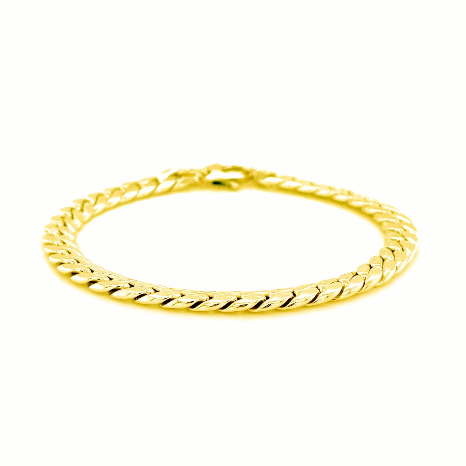 Elegant 14k yellow gold Cuban link bracelet featuring a sleek design, perfect for luxury jewelry enthusiasts.