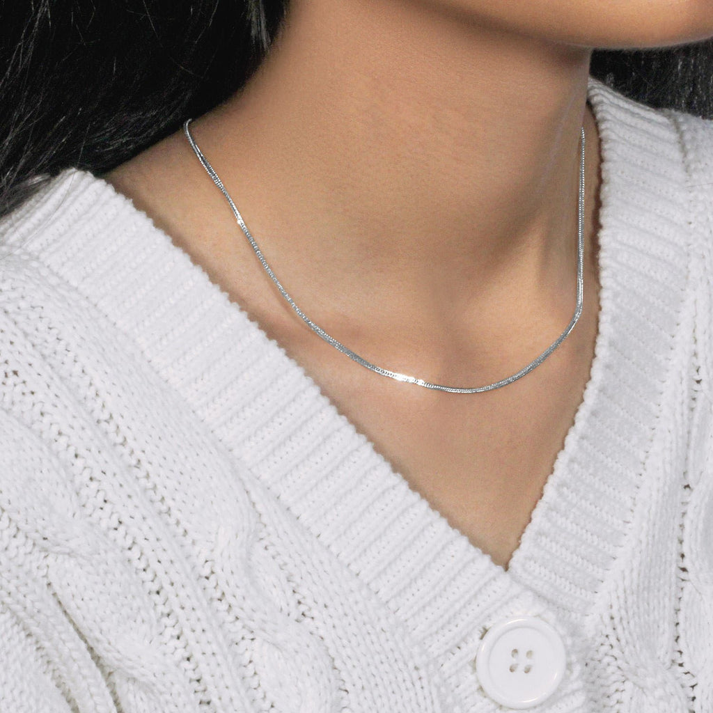 Elegant 14k white gold foxtail chain, 1.00 mm, showcasing a refined round design for luxurious layering.