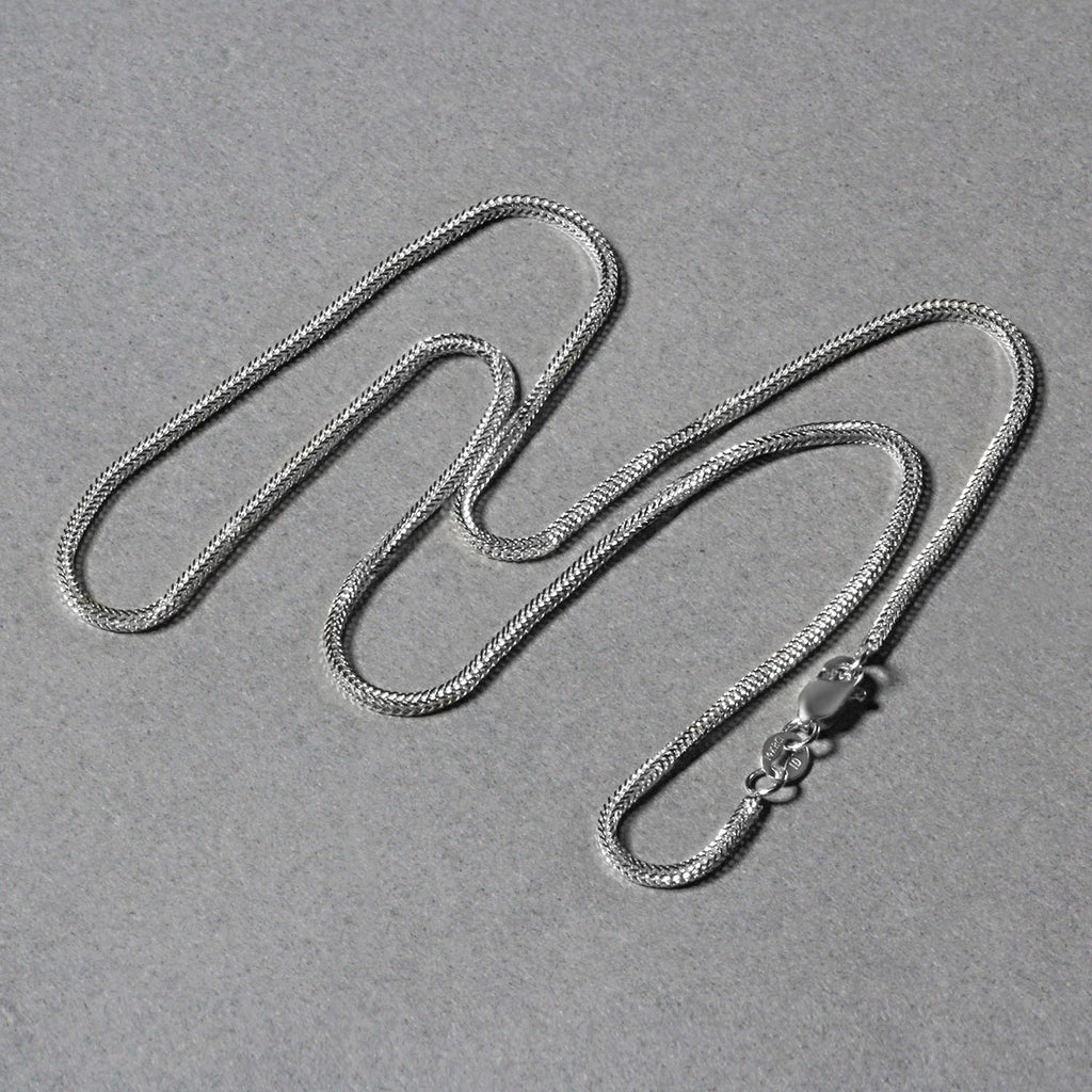 Elegant 14k white gold foxtail chain featuring a refined round design, perfect for layering or standalone wear.