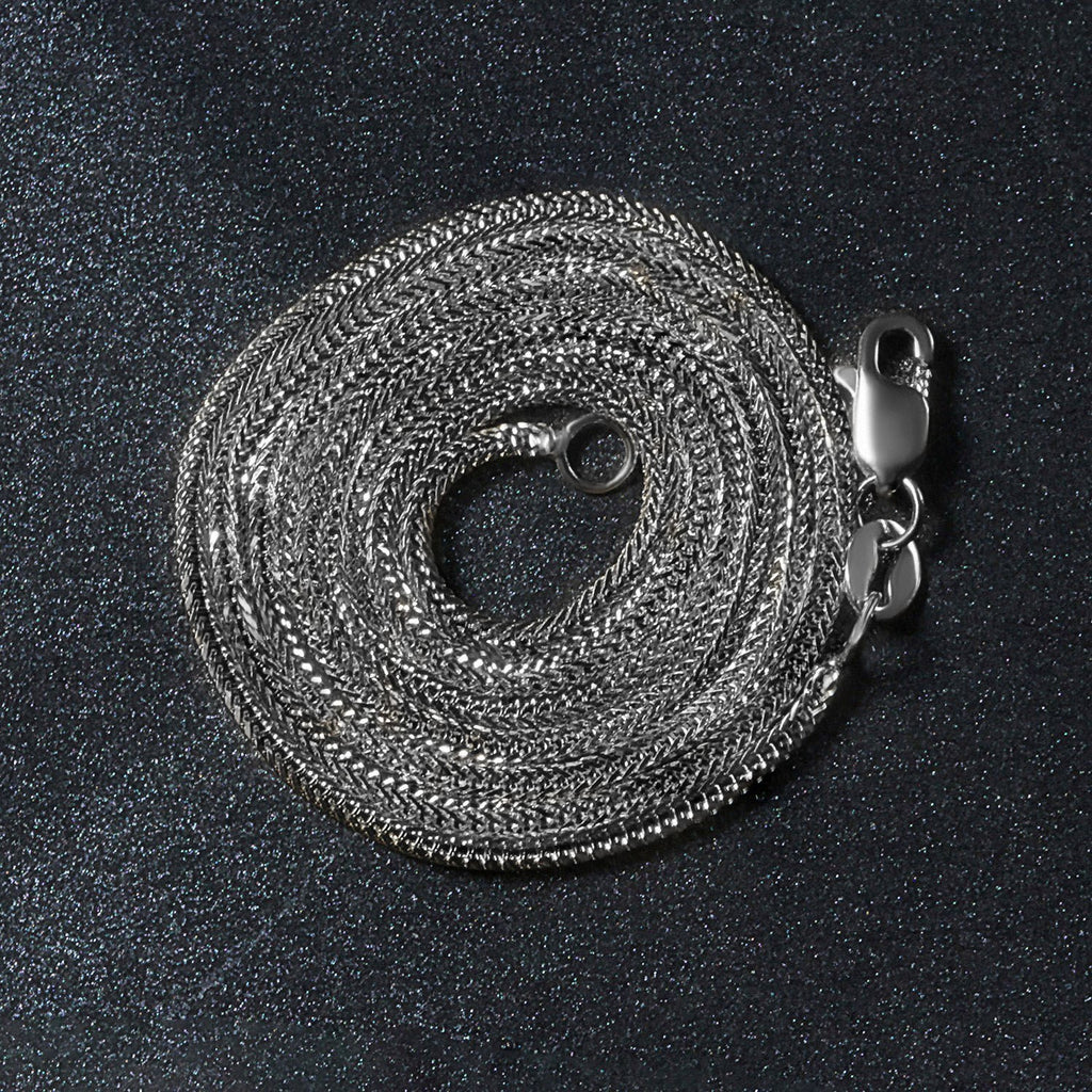 Elegant 14k white gold foxtail chain with a sleek round design, perfect for layering or standalone wear.