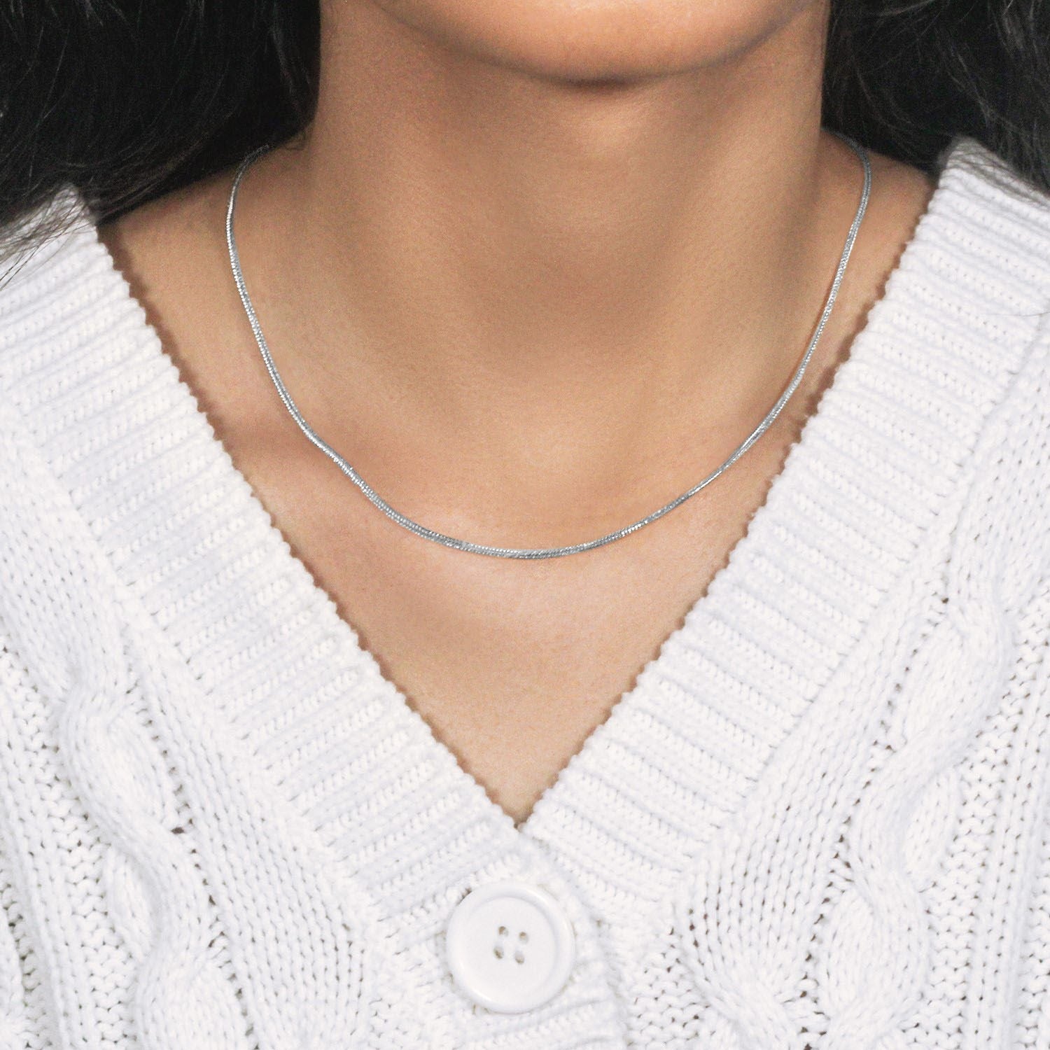 Elegant 14k white gold foxtail chain, 1.00 mm, showcasing a refined round design for luxurious layering.