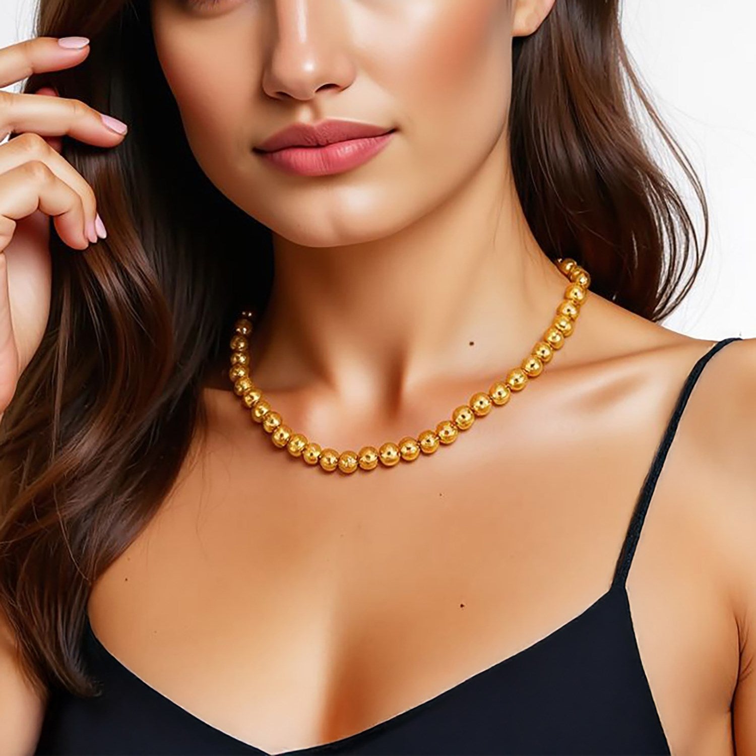 Contemporary 14k yellow gold bead chain necklace featuring 5mm polished beads for a luxurious touch.