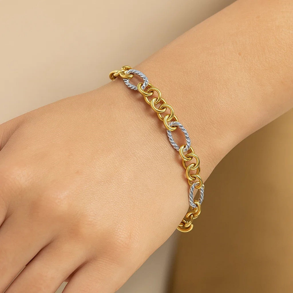 14k two-tone gold rope motif bracelet with oval and round links, showcasing classic elegance and refined craftsmanship.