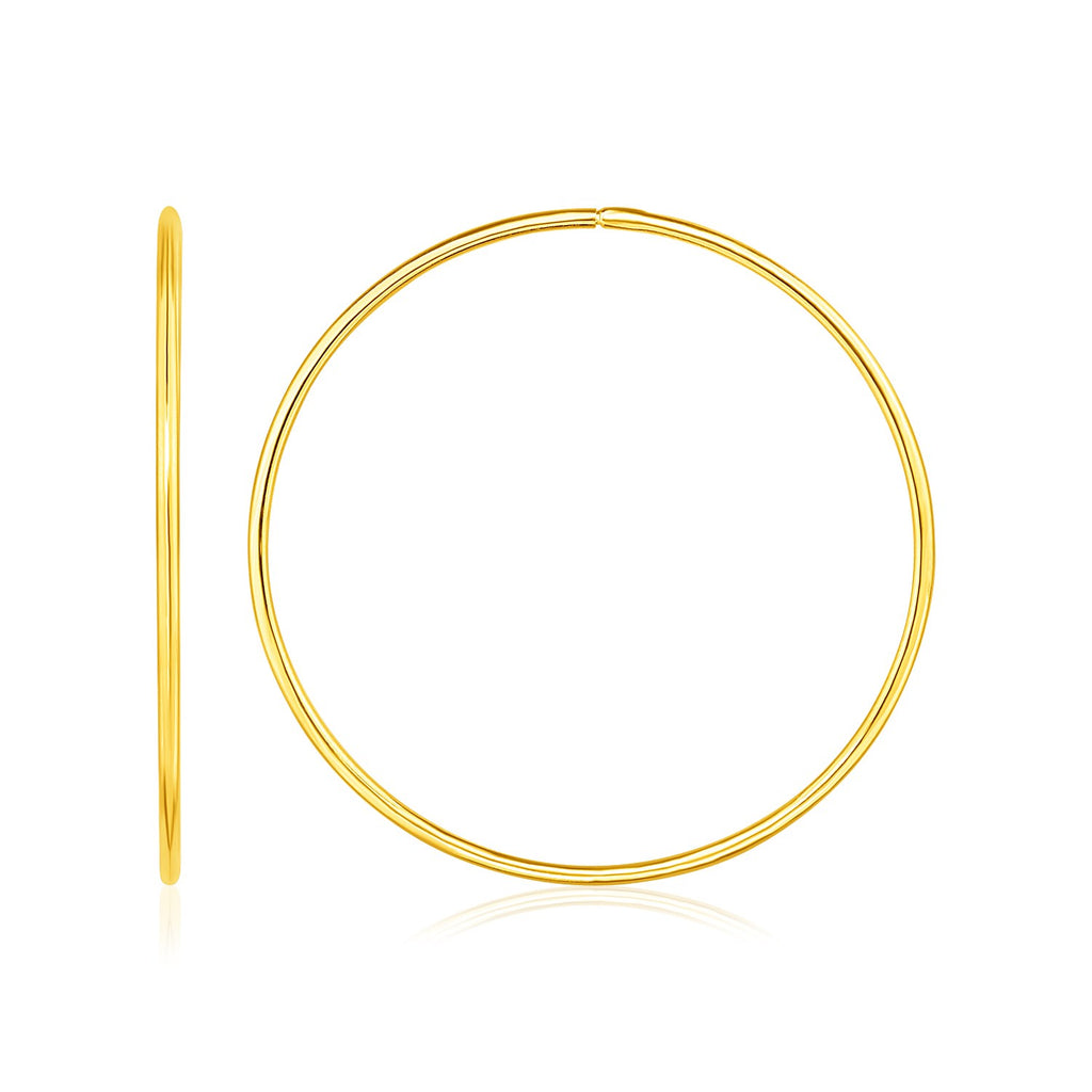 14k yellow gold modern endless hoop earrings, showcasing a sleek design perfect for elegant occasions.
