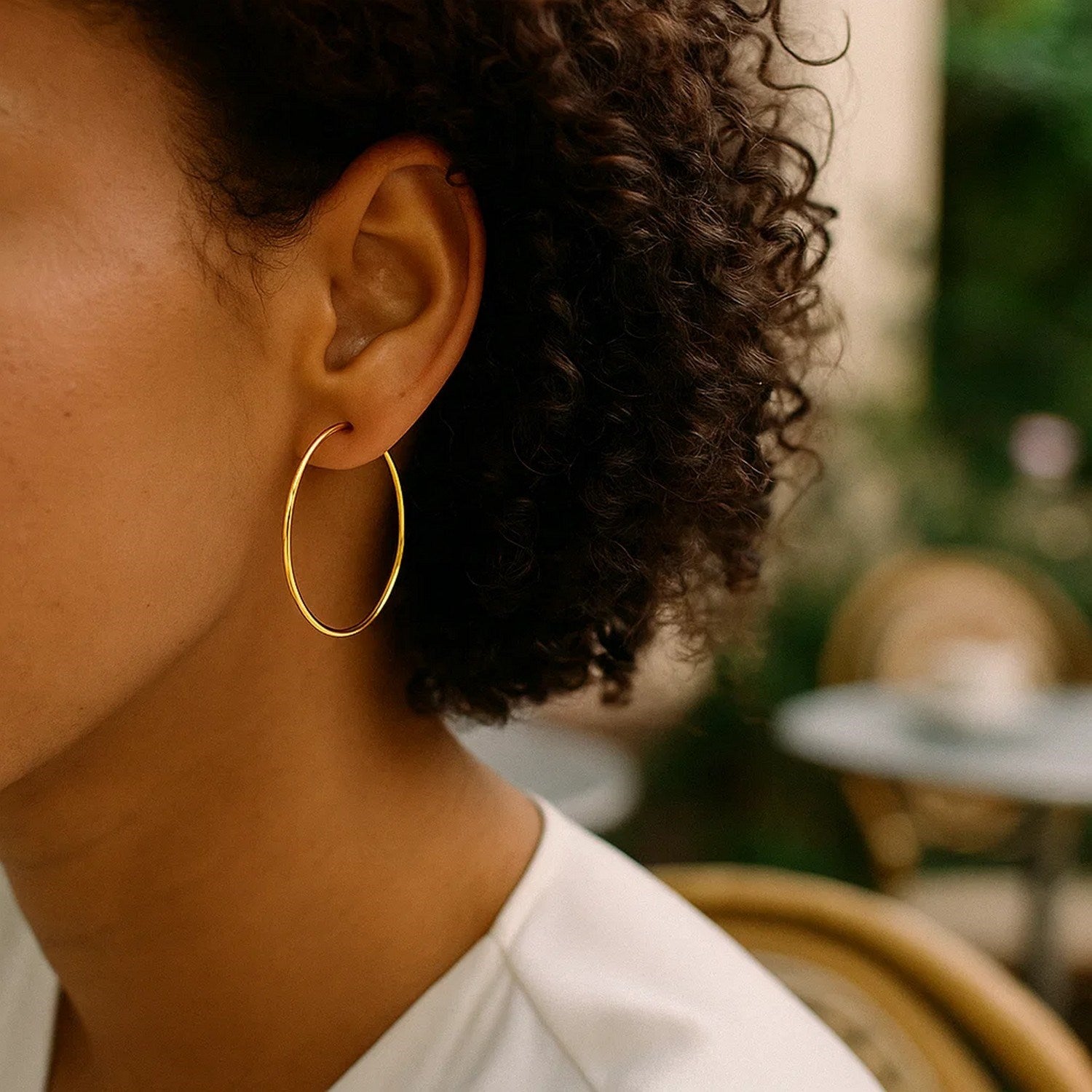 14k yellow gold modern endless hoop earrings showcasing a sleek, polished finish for timeless elegance.