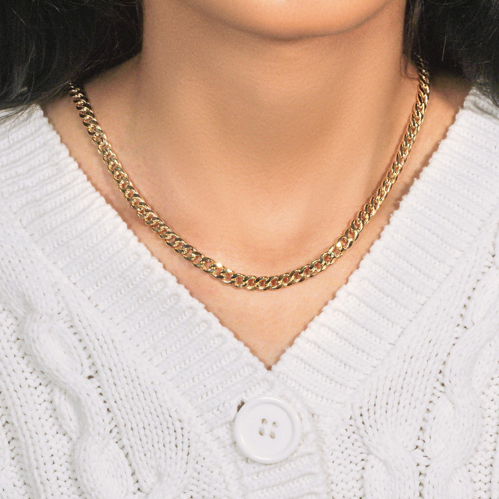 14k yellow gold Miami Cuban chain, semi-solid design, 5.50 mm width, exuding classic elegance and luxury craftsmanship.