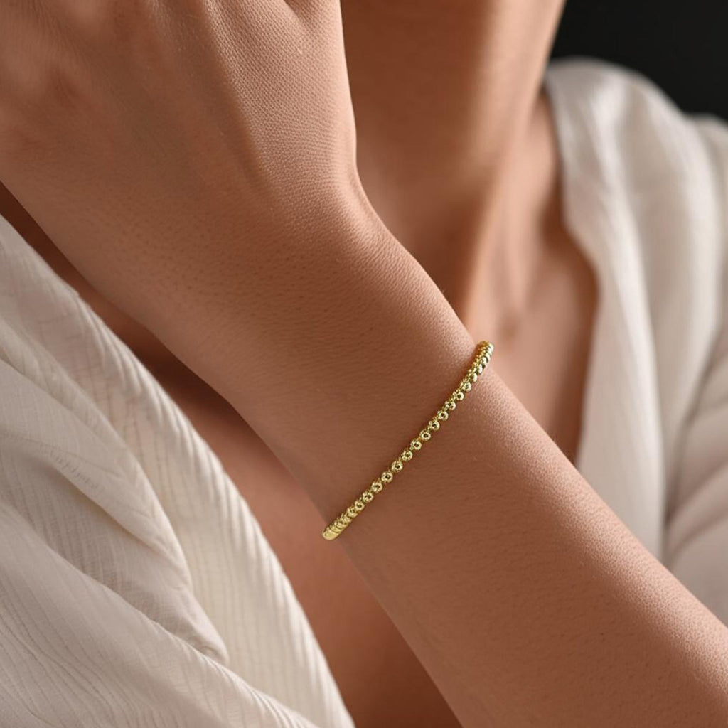 14k yellow gold high polish bead cuff bangle, modern luxury design, perfect for elegant layering or standalone wear.