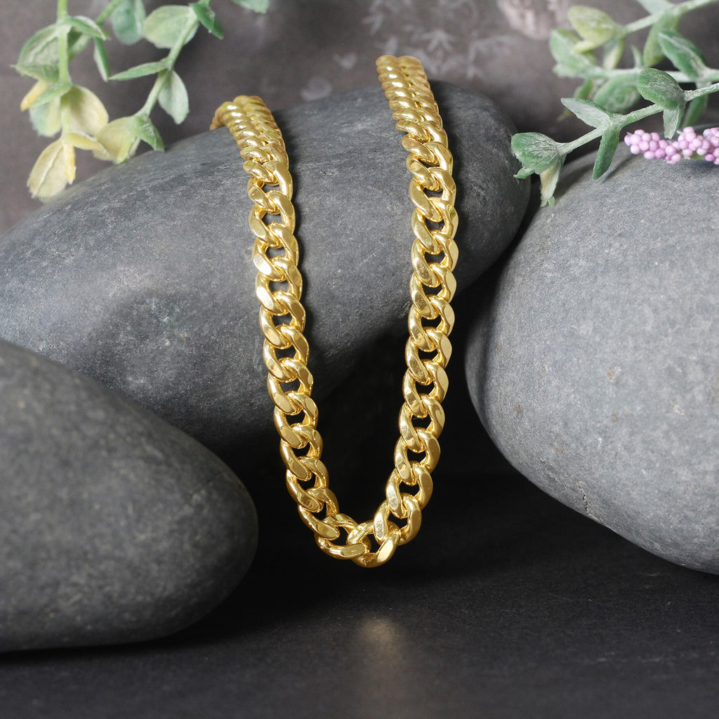14k yellow gold semi-solid Miami Cuban chain, 6.60 mm, featuring contemporary link design for a luxurious statement.