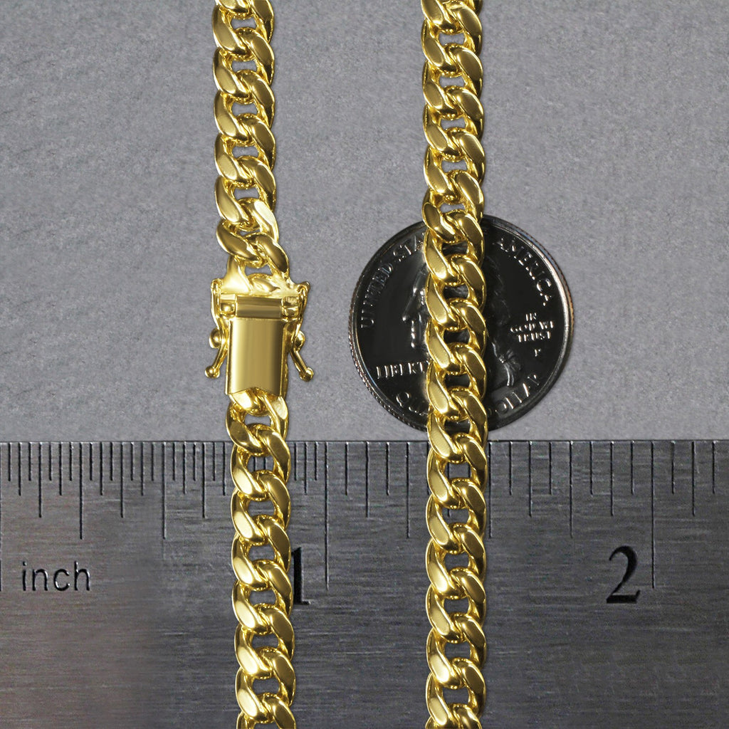 14k yellow gold Miami Cuban chain, 6.60 mm, featuring contemporary links for a luxurious statement piece.