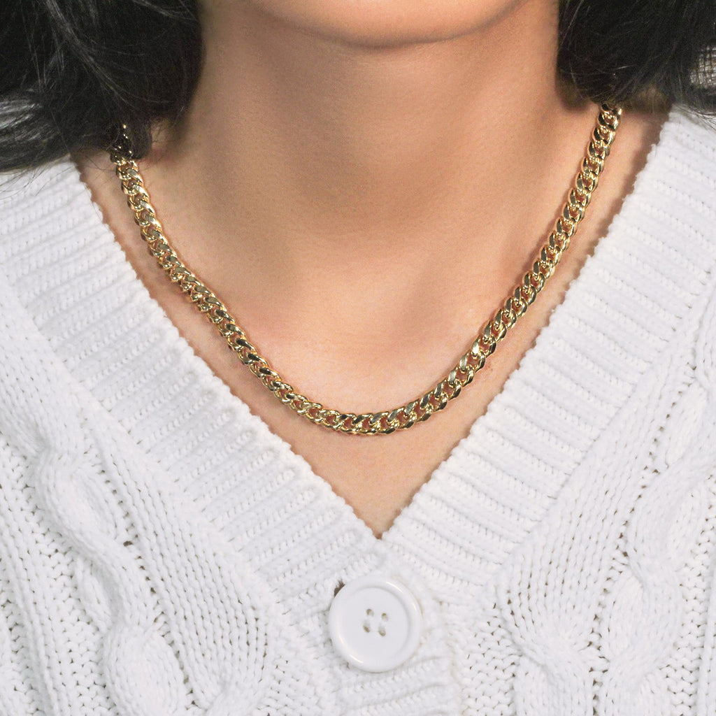 14k yellow gold semi-solid Miami Cuban chain with contemporary link design, showcasing luxury and elegance.