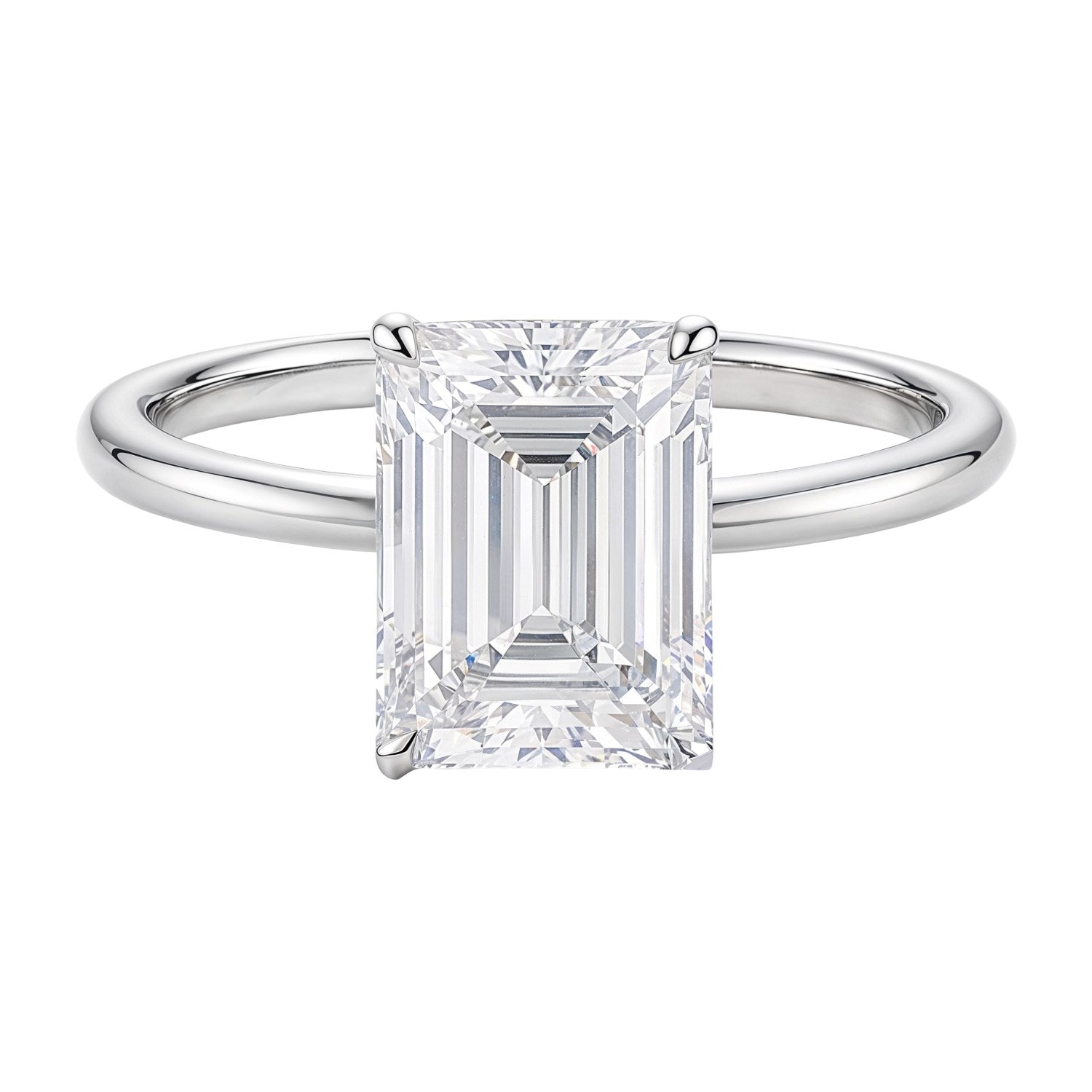 14k white gold solitaire ring featuring a 3 carat emerald and IGI G/VS1 diamond for a modern, elegant look.