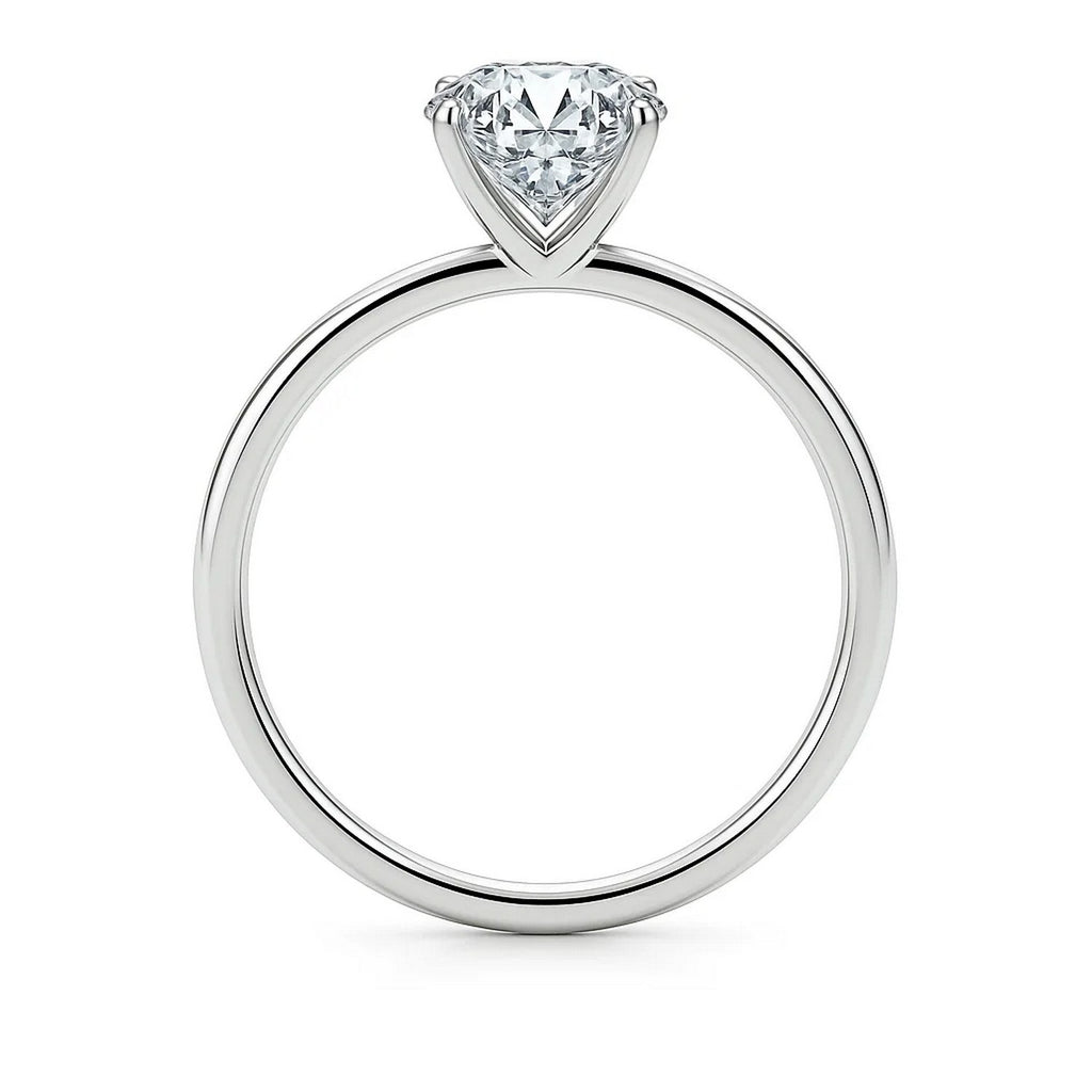 14k white gold solitaire ring featuring a 3 carat lab-grown emerald and IGI G/VS1 diamond, modern elegance redefined.