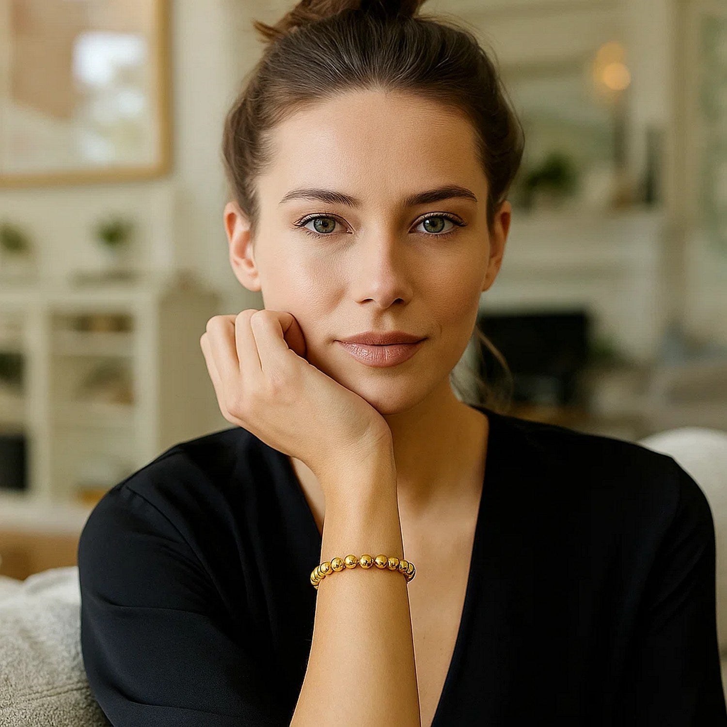 Polished 7mm bead bracelet in luxurious 14k yellow gold, showcasing minimalist elegance and timeless style.