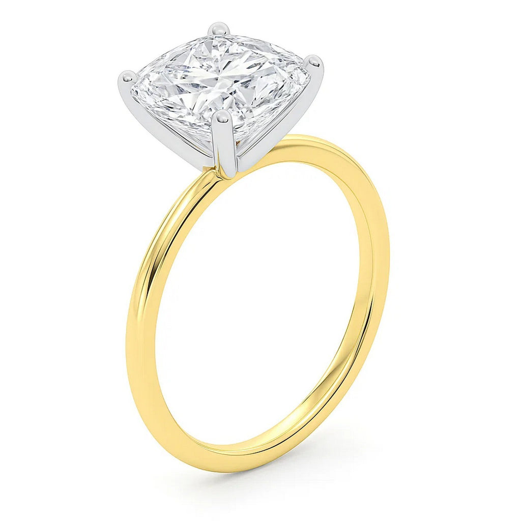 5 carat cushion cut diamond solitaire ring in 14k yellow gold, showcasing elegant design and exceptional craftsmanship.