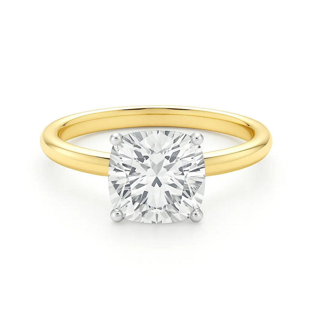 5 carat cushion cut diamond solitaire ring in 14k yellow gold, showcasing elegance and timeless luxury.