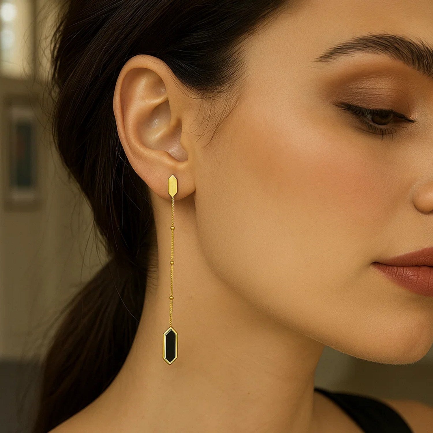 14K yellow gold contemporary drop earrings featuring hexagon onyx and elegant chain design.