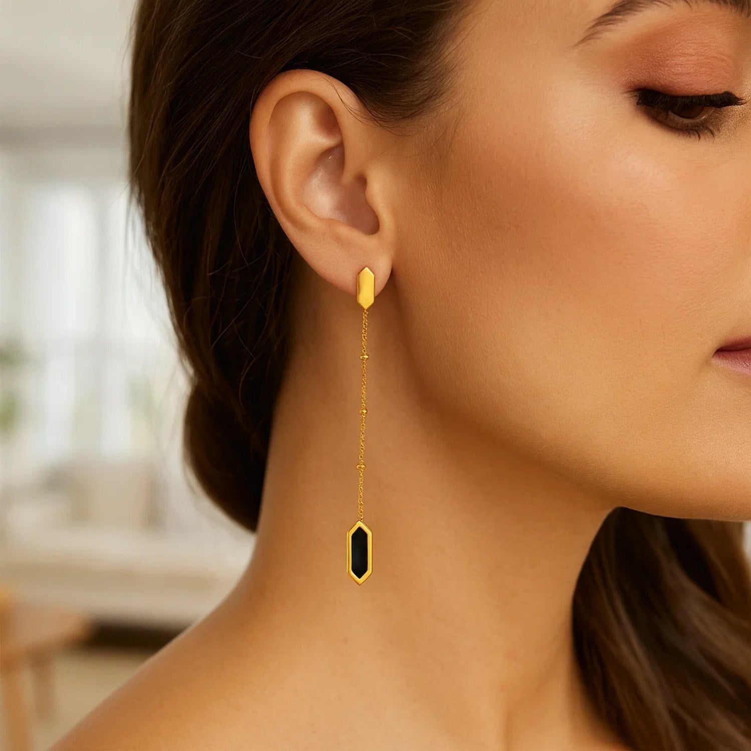 14k yellow gold contemporary drop earrings featuring hexagon onyx and elegant chain design.