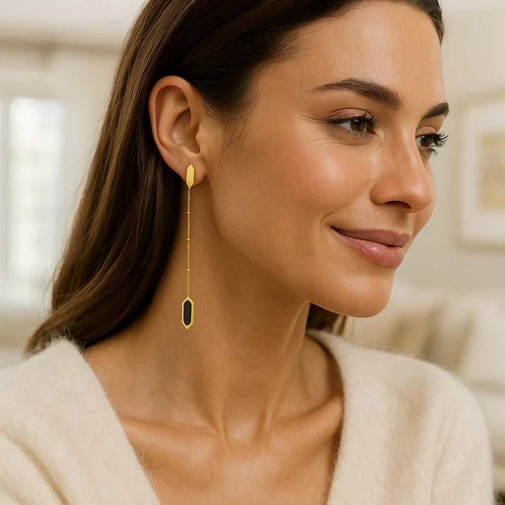 14K yellow gold contemporary drop earrings featuring hexagon onyx and elegant chain design.