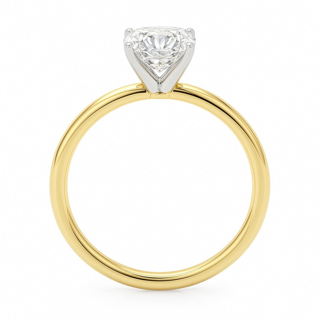 14k yellow gold solitaire ring featuring a stunning 2 carat cushion cut lab-grown diamond, classic elegance redefined.